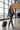 Female model travelling with Voyager Carry-On Suitcase in Midnight Blue