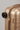 Voyager Carry-On Suitcase in Champagne Sand – Handle, wheel & zipper detail